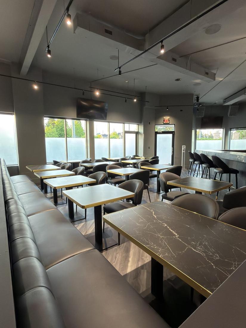 Full dining room with banquette seating