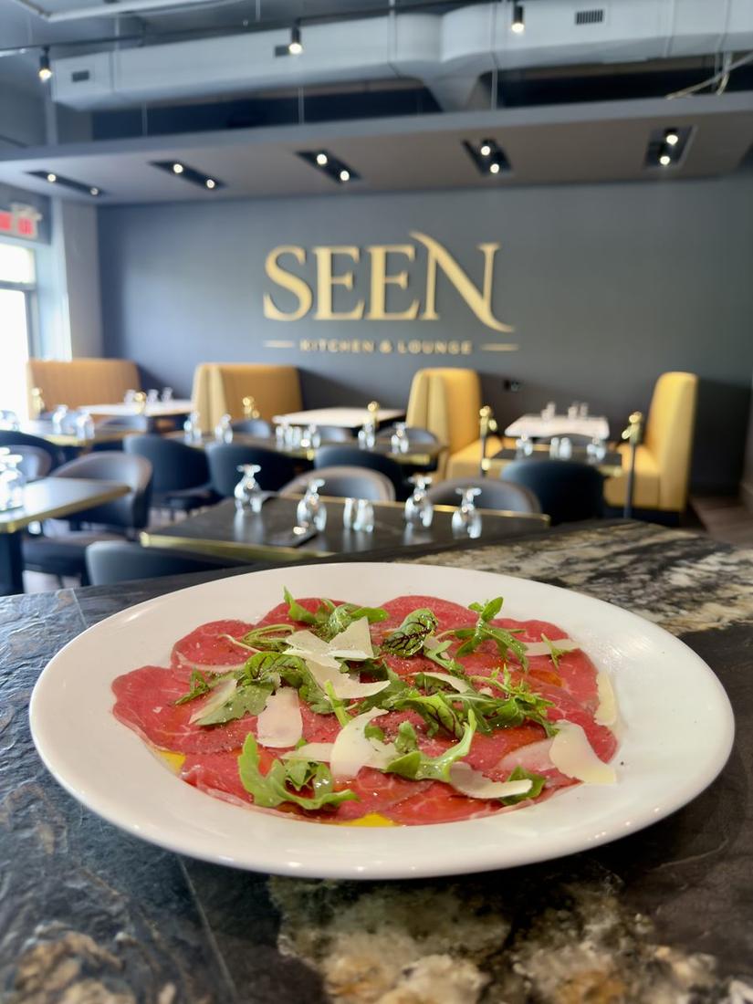 Beef Carpaccio with arugula and Parmigiano
