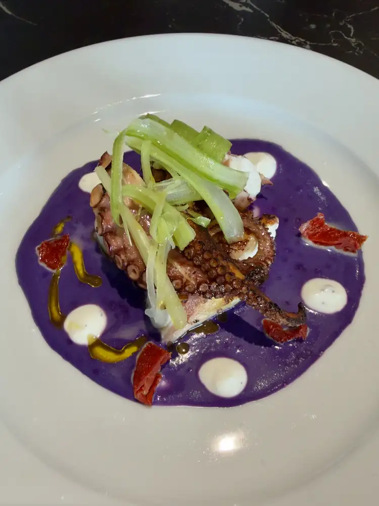 Chef Valter's Specialty, chargrilled octopus with purple potato purée